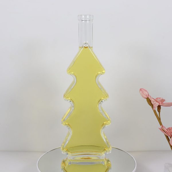 Custom design 500ml Christmas Tree Shape Liquor Wine vodka Glass Bottle 680g