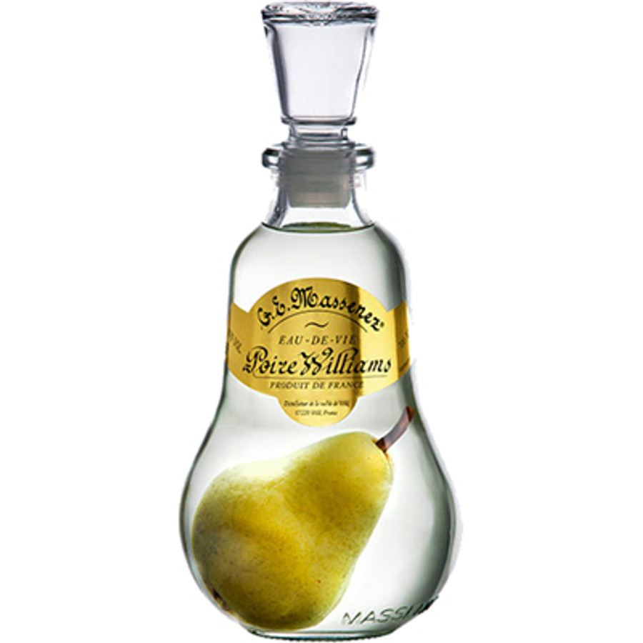 There is a full sized pear in a bottle of brandy. how does it get there?
